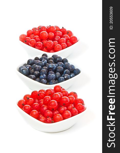 Blueberries and red currants in bowls. Blueberries and red currants in bowls