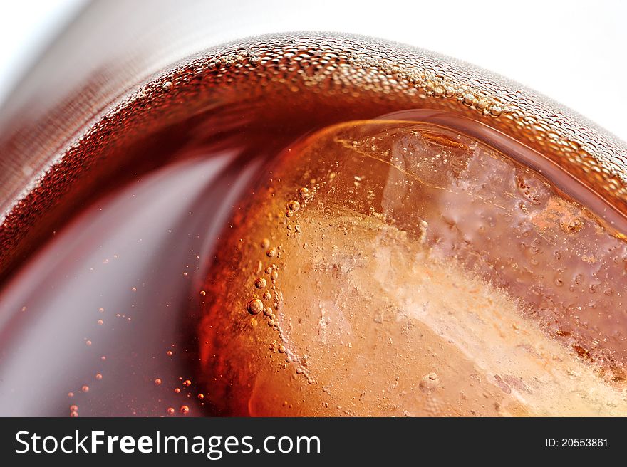 Drink with ice cube close up