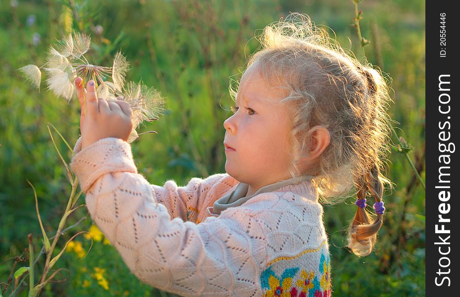 Girl With A Large Dandelion