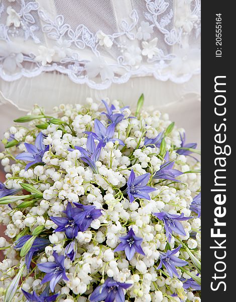 Closeup shot of wedding bouquet made from lily of the valley