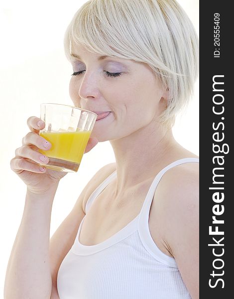 Woman eat green apple isolated  on white backround in studio representing healthy lifestile and eco food concept. Woman eat green apple isolated  on white backround in studio representing healthy lifestile and eco food concept