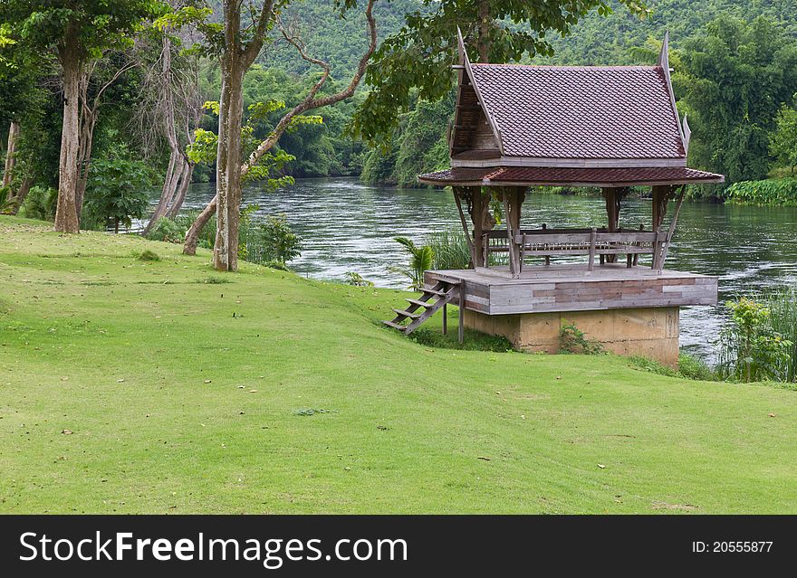 Thai wooden house near the river