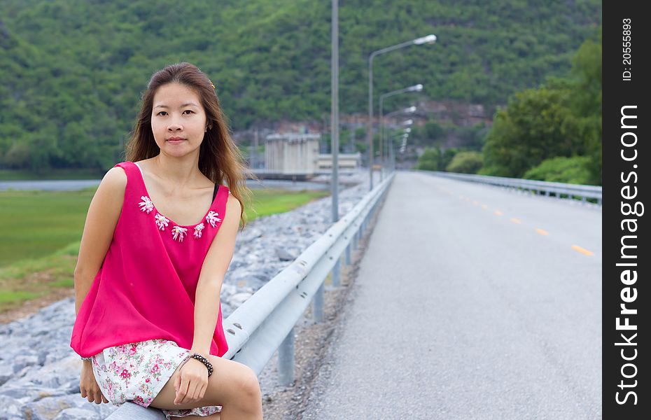 Asian girl and beautiful landscape in evening