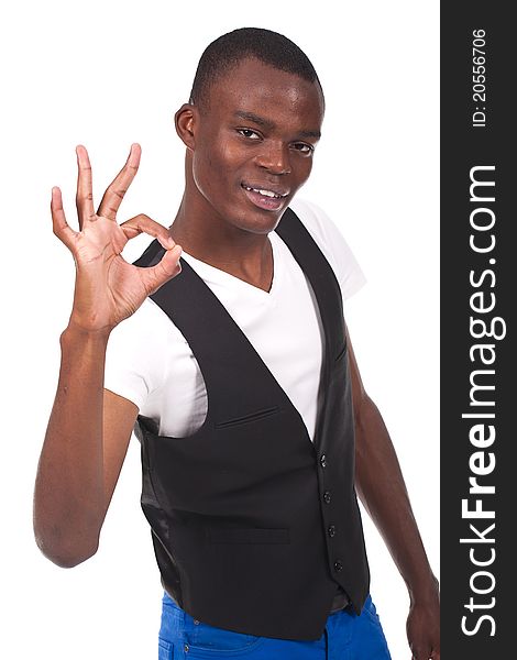 Young and beautiful black man doing ok sign