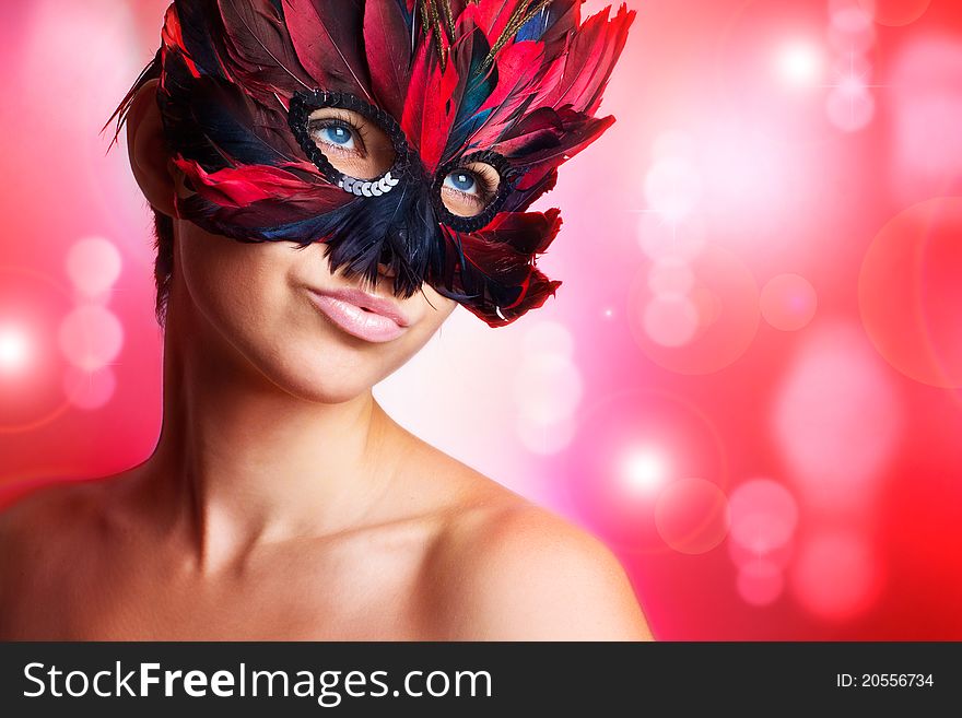 Portrait of beautiful woman in mask