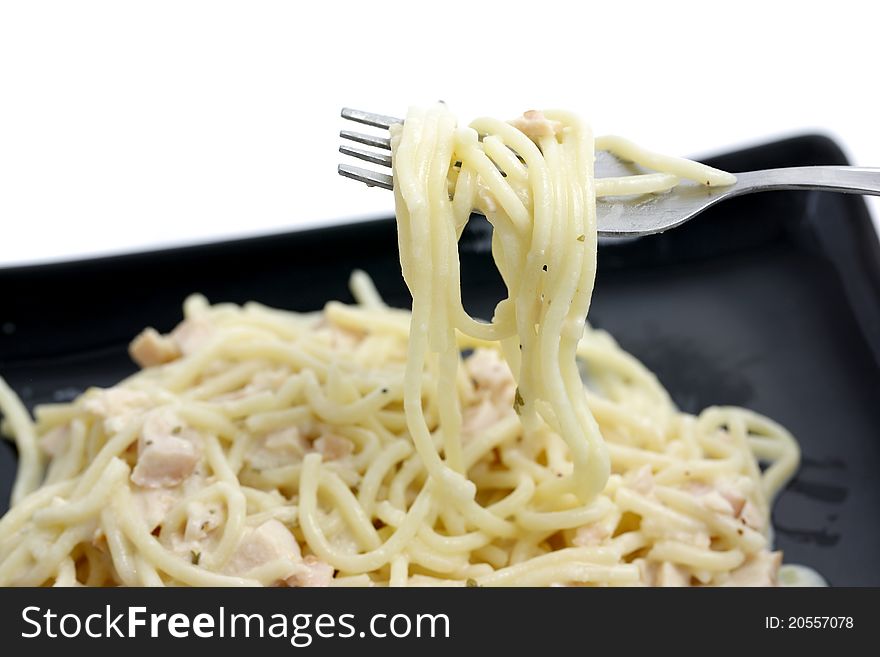 Spaghetti Carbonara isolated on white background