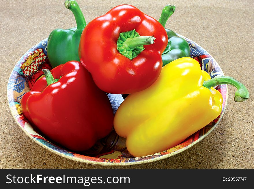 Fresh green, yellow and red peppers