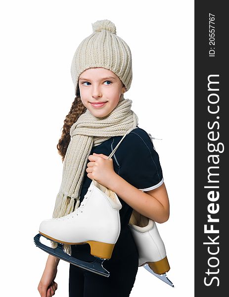 Cute little girl with figure skates