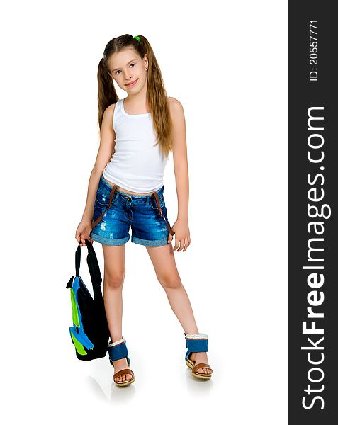 Cute schoolchild with knapsack on white background