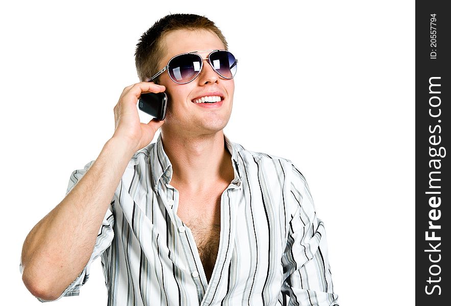 Young man with a phone. White background