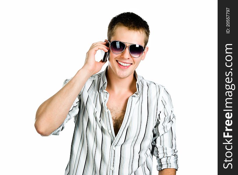 Young man with a phone. White background