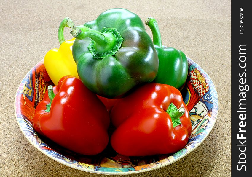 Fresh green, yellow and red peppers
