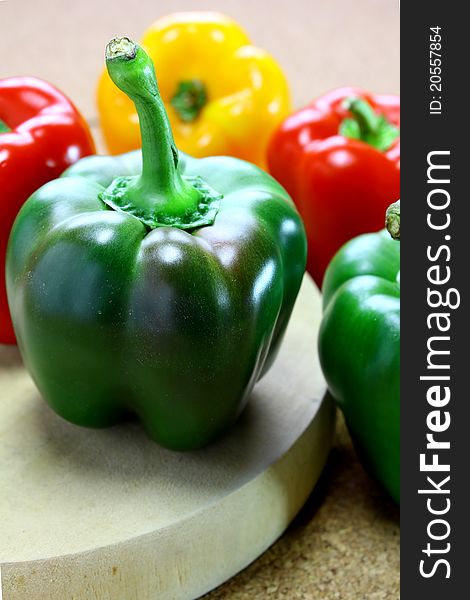 Fresh green, yellow and red peppers