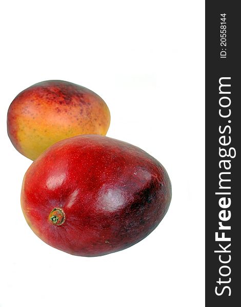 Two ripe mango over white background