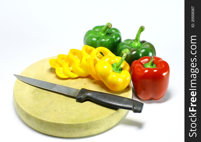 Fresh green, yellow and red peppers