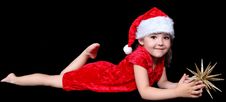 Little Girl In Santa Hat With Golden Star Royalty Free Stock Image Little Girl In Santa Hat With Golden Star Royalty Free Stock Image