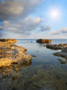 Stones Into The Sea Stock Photography