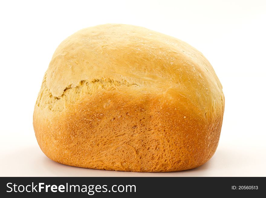 Fresh hot homemade bread on a white background