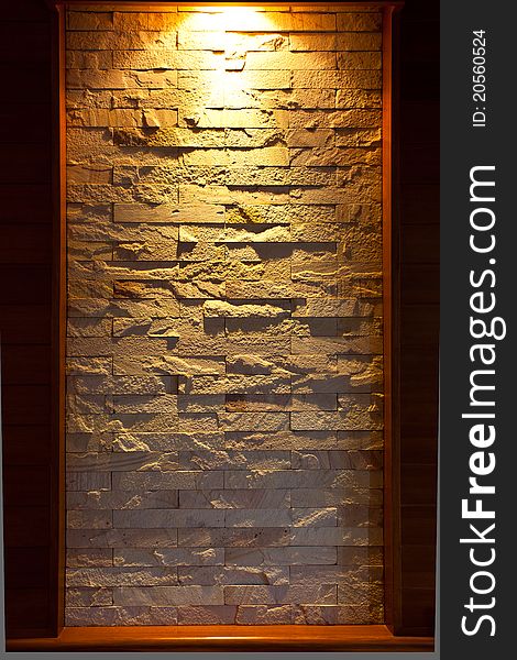 Stone walls are decorated with lights. Stone walls are decorated with lights