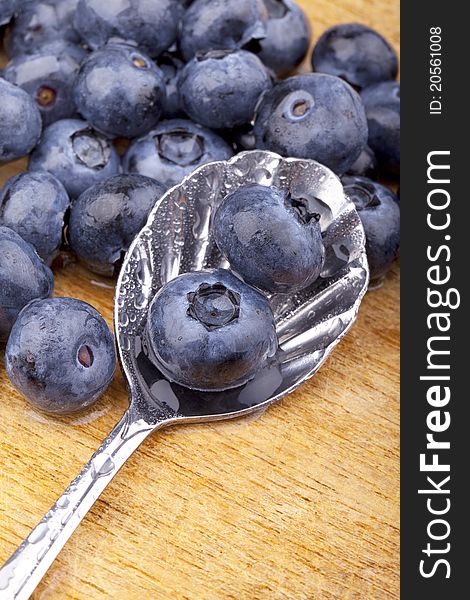 Studio- shot of blueberries on a spoon