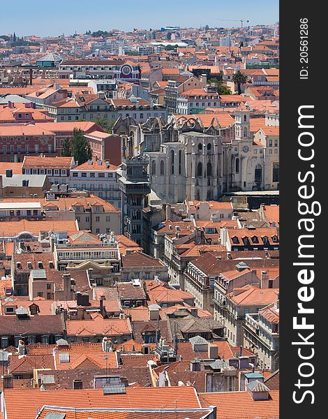 Lisbon rooftops pictured from Castello Sao Jorge. Elevador Santa Justa is visible in the picture too