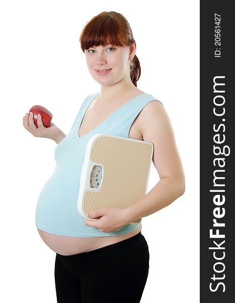 Pregnant Woman With A Measuring Tape