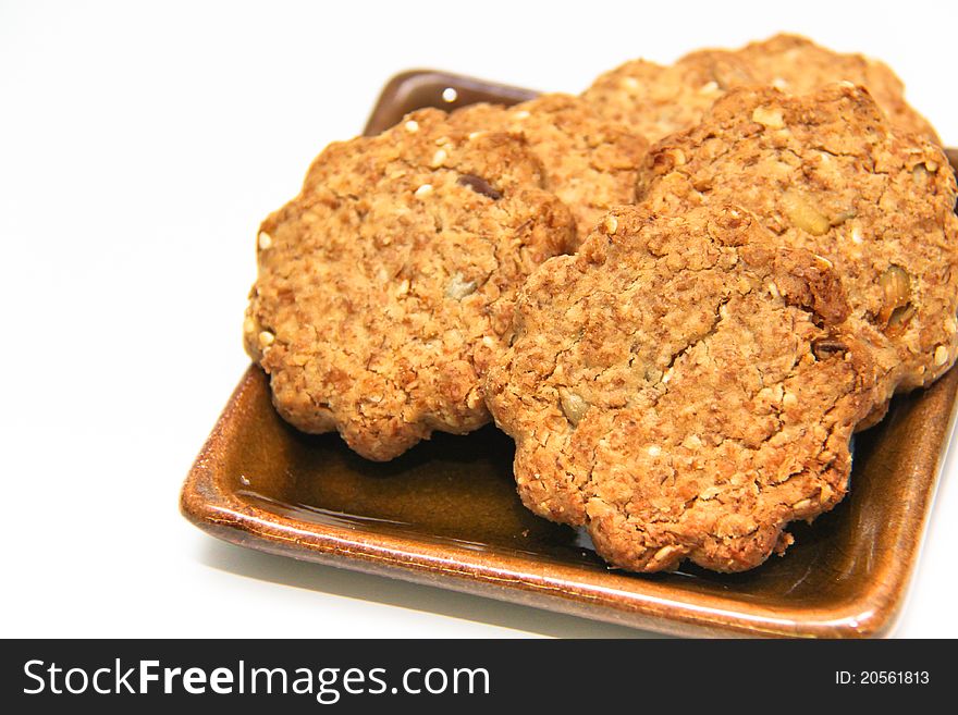 Plate of cookies isolated on white background