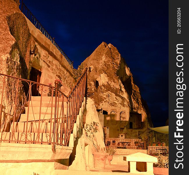 Steps and hand rail of a cave house in Goreme, square format, night scene, copy space, crop space, rich night sky. Steps and hand rail of a cave house in Goreme, square format, night scene, copy space, crop space, rich night sky