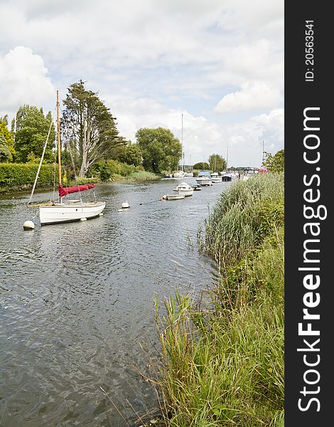 Sailing boats moored on river. Sailing boats moored on river