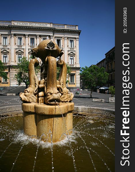 Square in the city centre of Catania with fountain and the Building of Finance. Square in the city centre of Catania with fountain and the Building of Finance