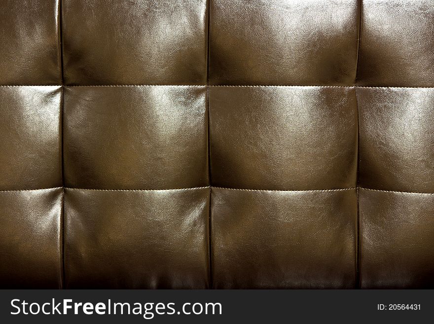 Detailed pattern of an Brown leather couch. Detailed pattern of an Brown leather couch