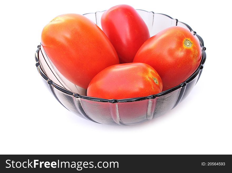 Fresh tomatoes tomatoes in bowl  on a white background close-up
