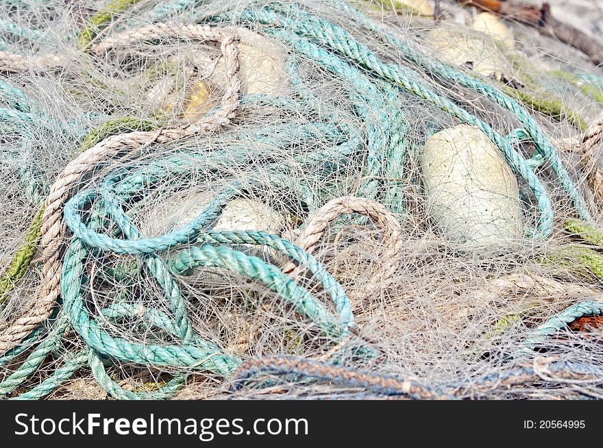 Close-up of fishing net and floats background