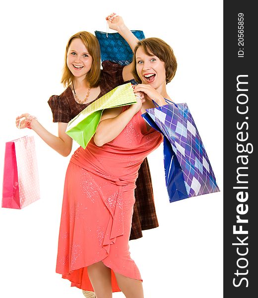 Girls with shopping on white background.