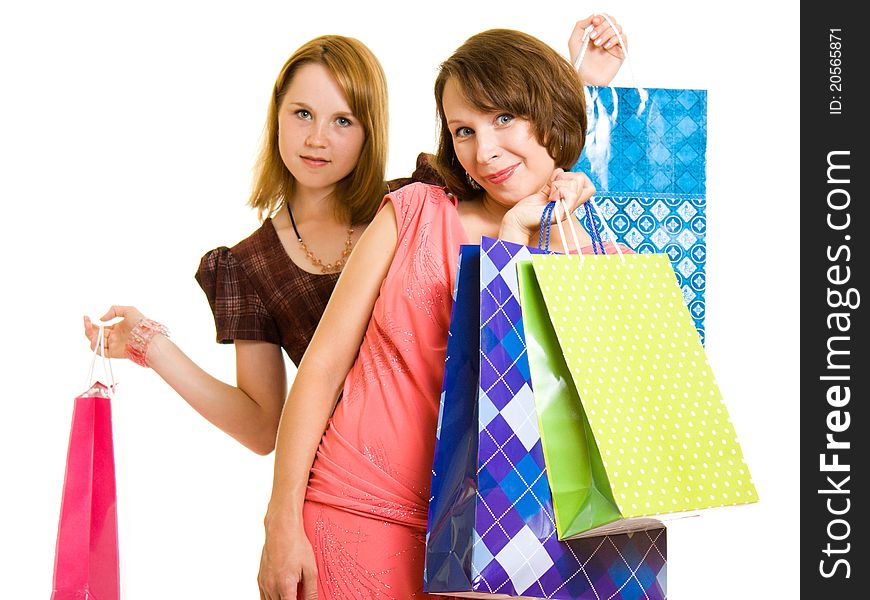 Girls with shopping on white background.