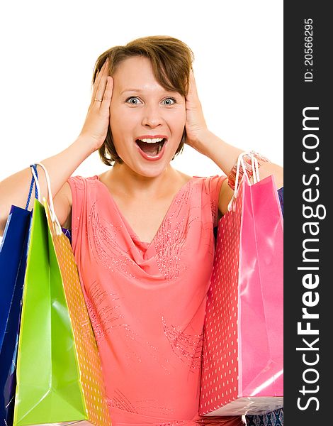 Girl with shopping on white background.