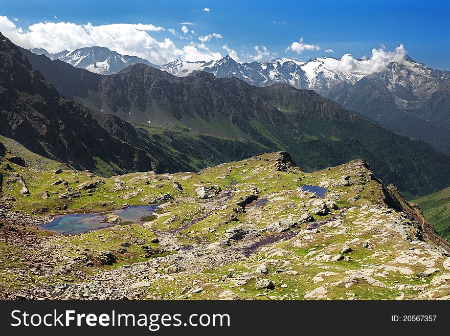 Small lakes in high mountain during summer. Small lakes in high mountain during summer