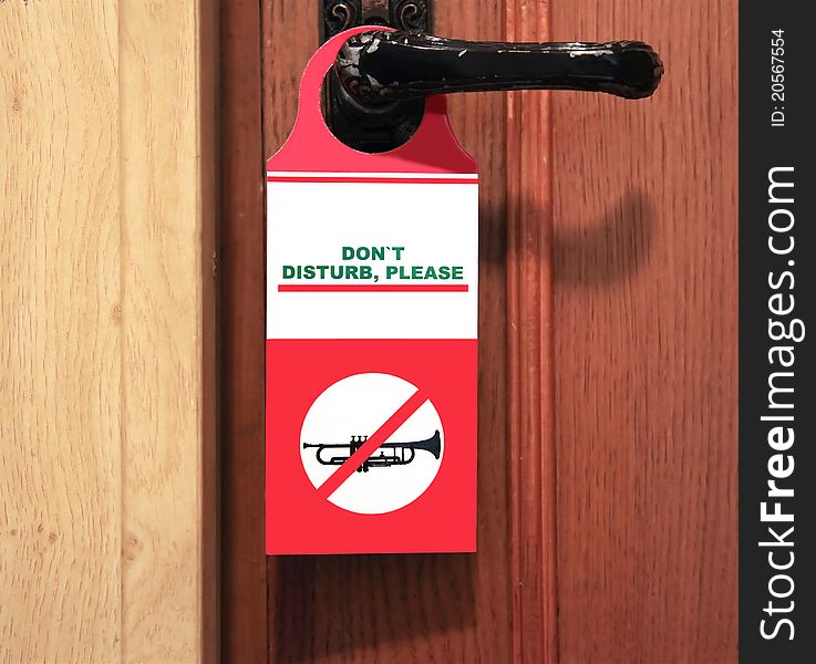 Sign on the door handle do not disturb