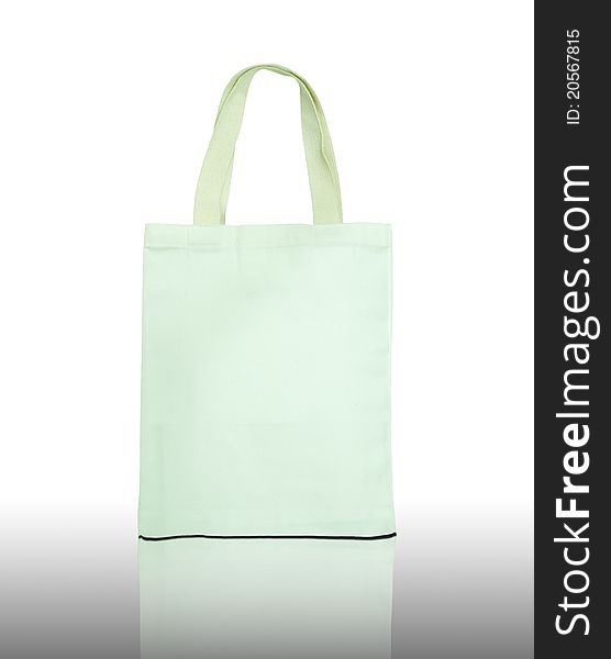 White cotton bag on reflect floor and white background