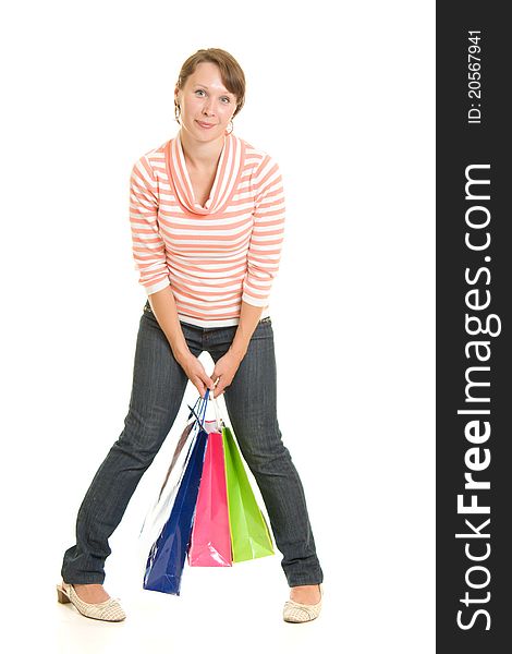 Girl with shopping on white background.