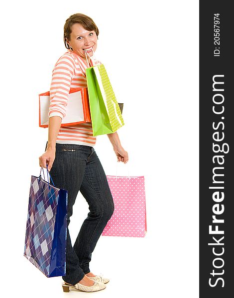 Girl with shopping on white background.