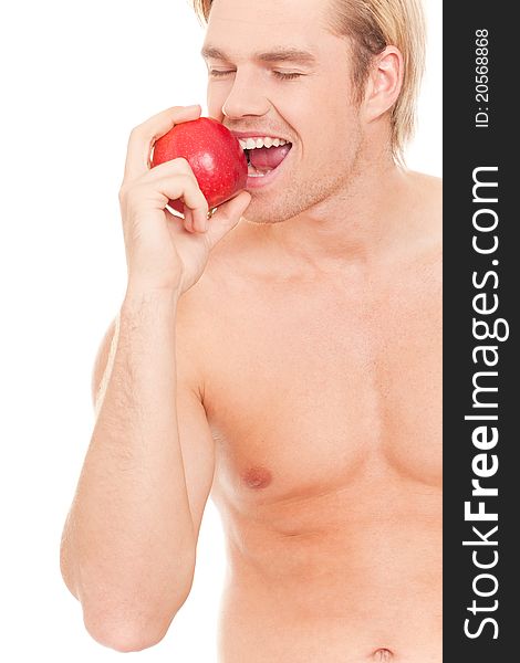 Happy man eating an apple
