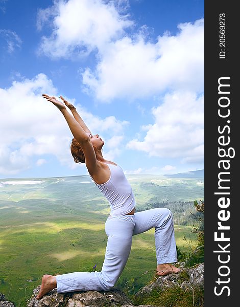 Female gymnastics on the cliff edge. Female gymnastics on the cliff edge