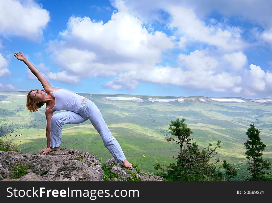 Female gymnastics on the cliff edge. Female gymnastics on the cliff edge