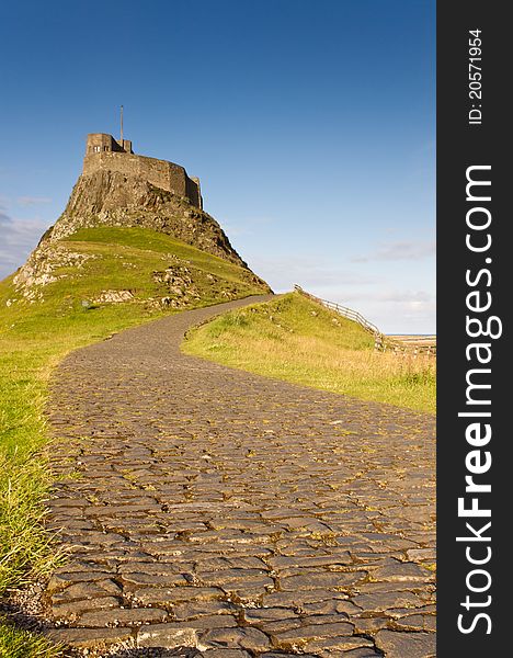 Cobbled road leading to Lindisfarne Castle on Holy Island. Cobbled road leading to Lindisfarne Castle on Holy Island