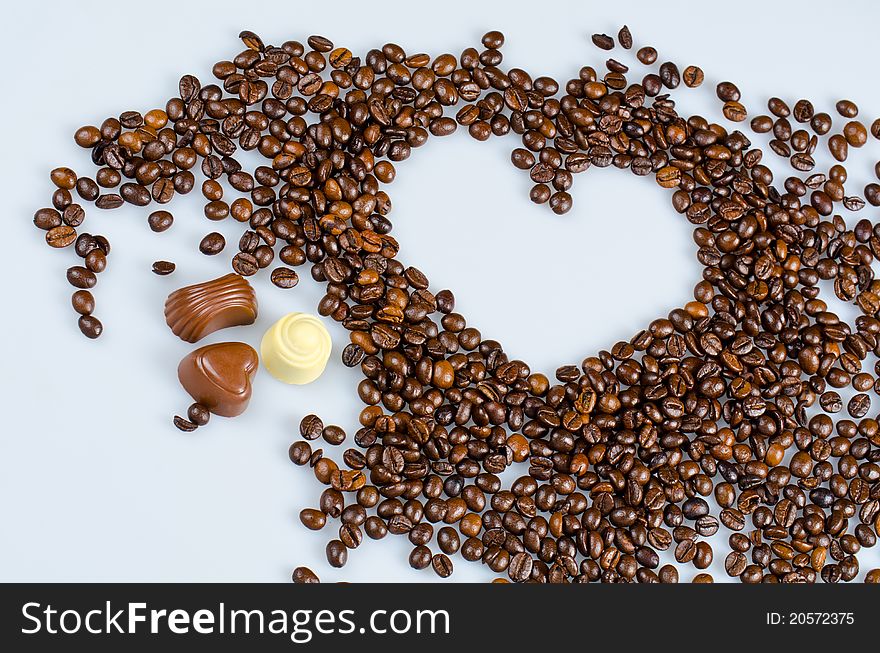 Creative photo of a heart made from coffee beans. Creative photo of a heart made from coffee beans