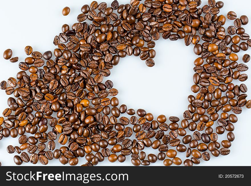 Creative photo of a heart made from coffee beans. Creative photo of a heart made from coffee beans