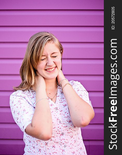 Teenage girl with shutters in the background. Teenage girl with shutters in the background