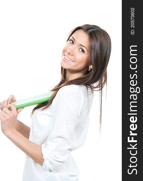 Pretty business woman smiling, holding notepad, ebook in green case on a white background