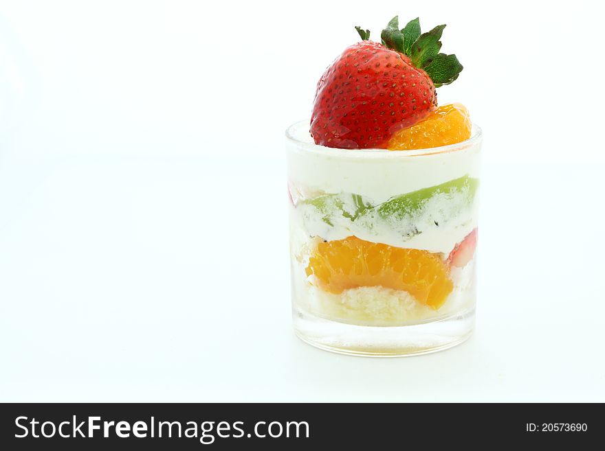 Fruit cup cake on a white background.